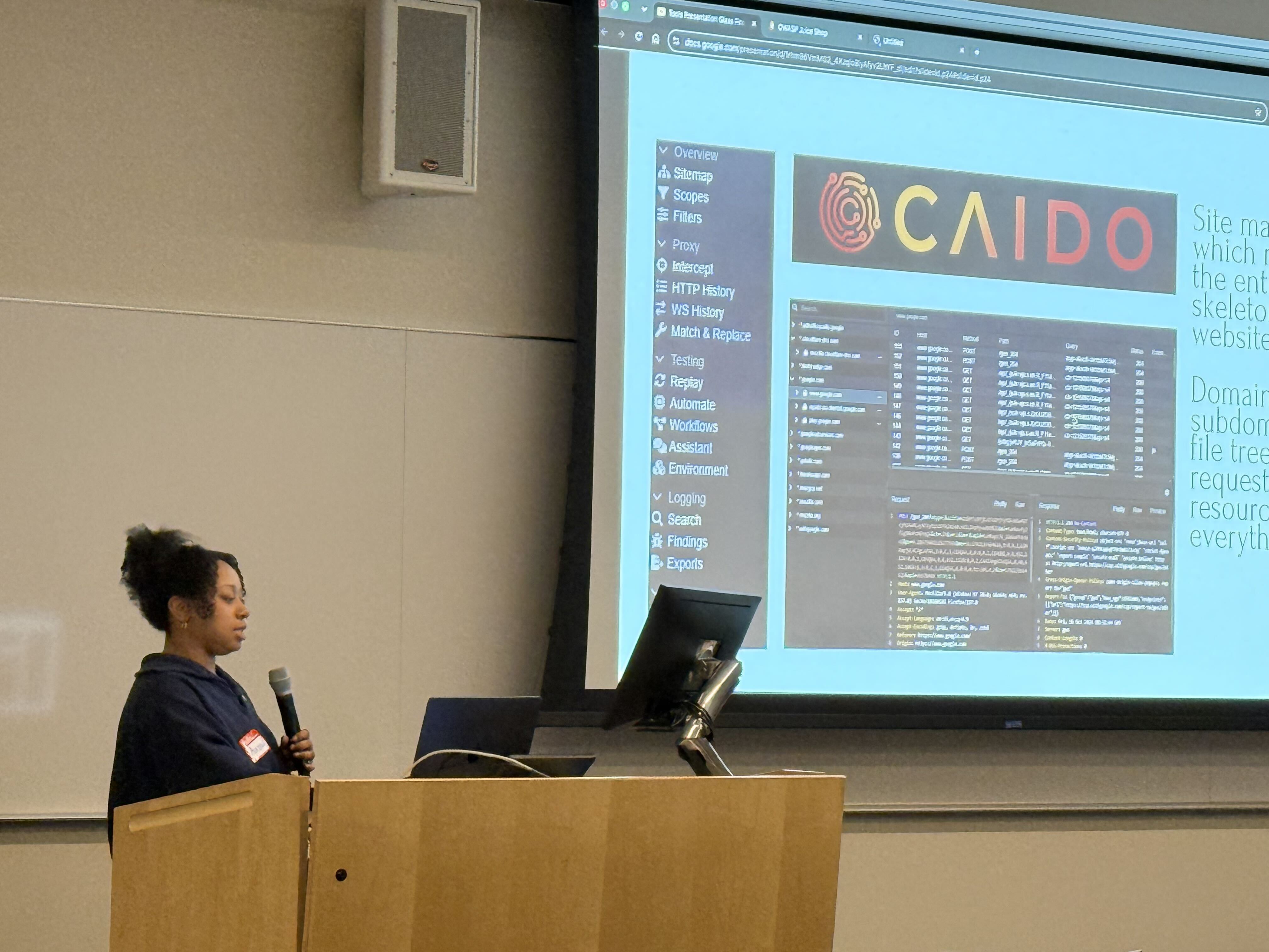 A cybersecurity instructor demonstrating a testing tool at Glass Firewall 2026