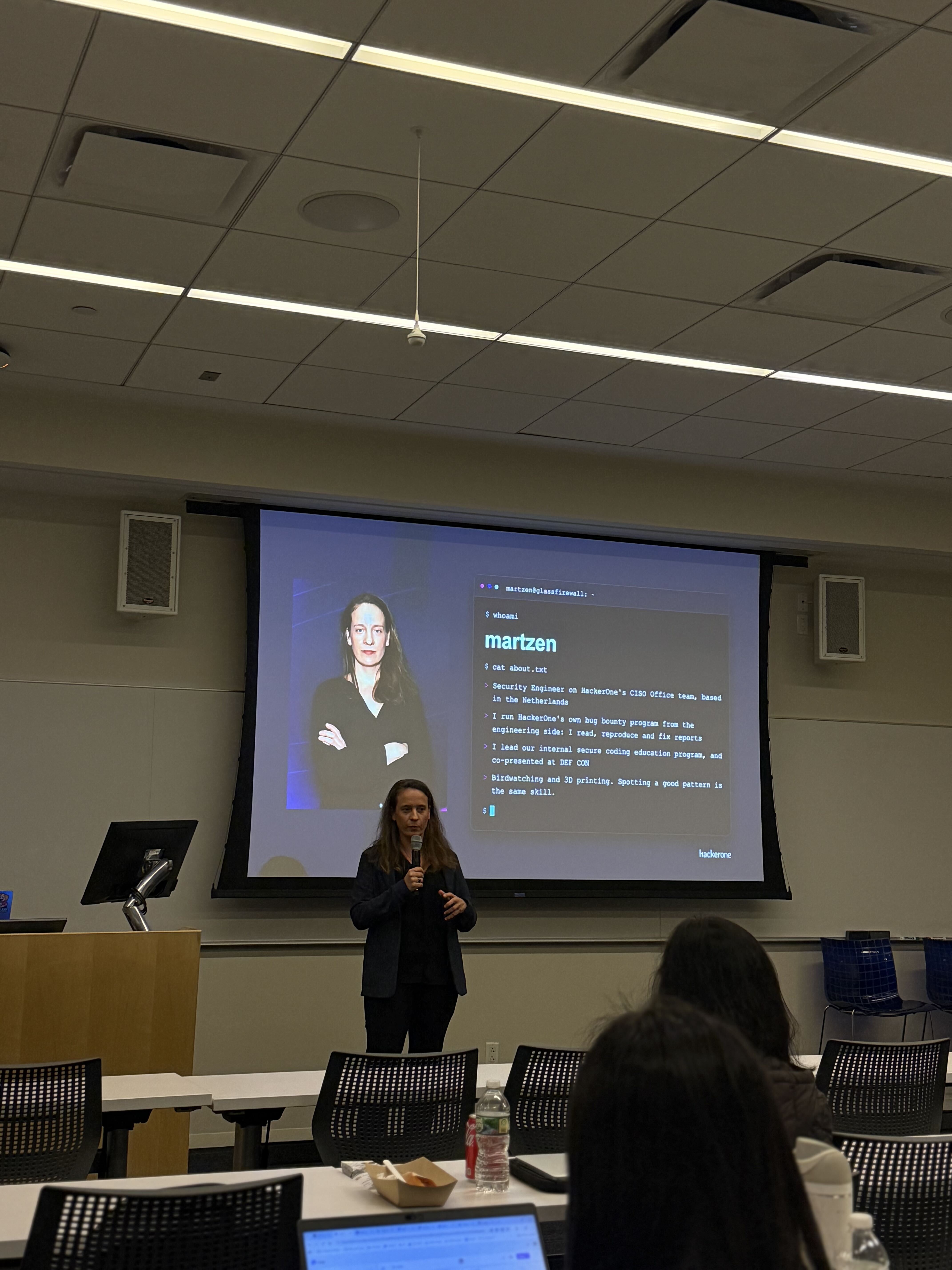 A speaker presenting at Glass Firewall 2026 in New York